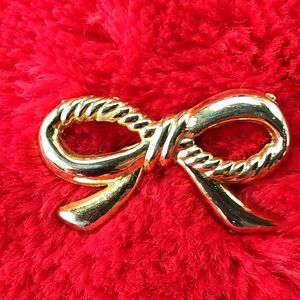 Vintage MCM Bow Gold Tone Brooch